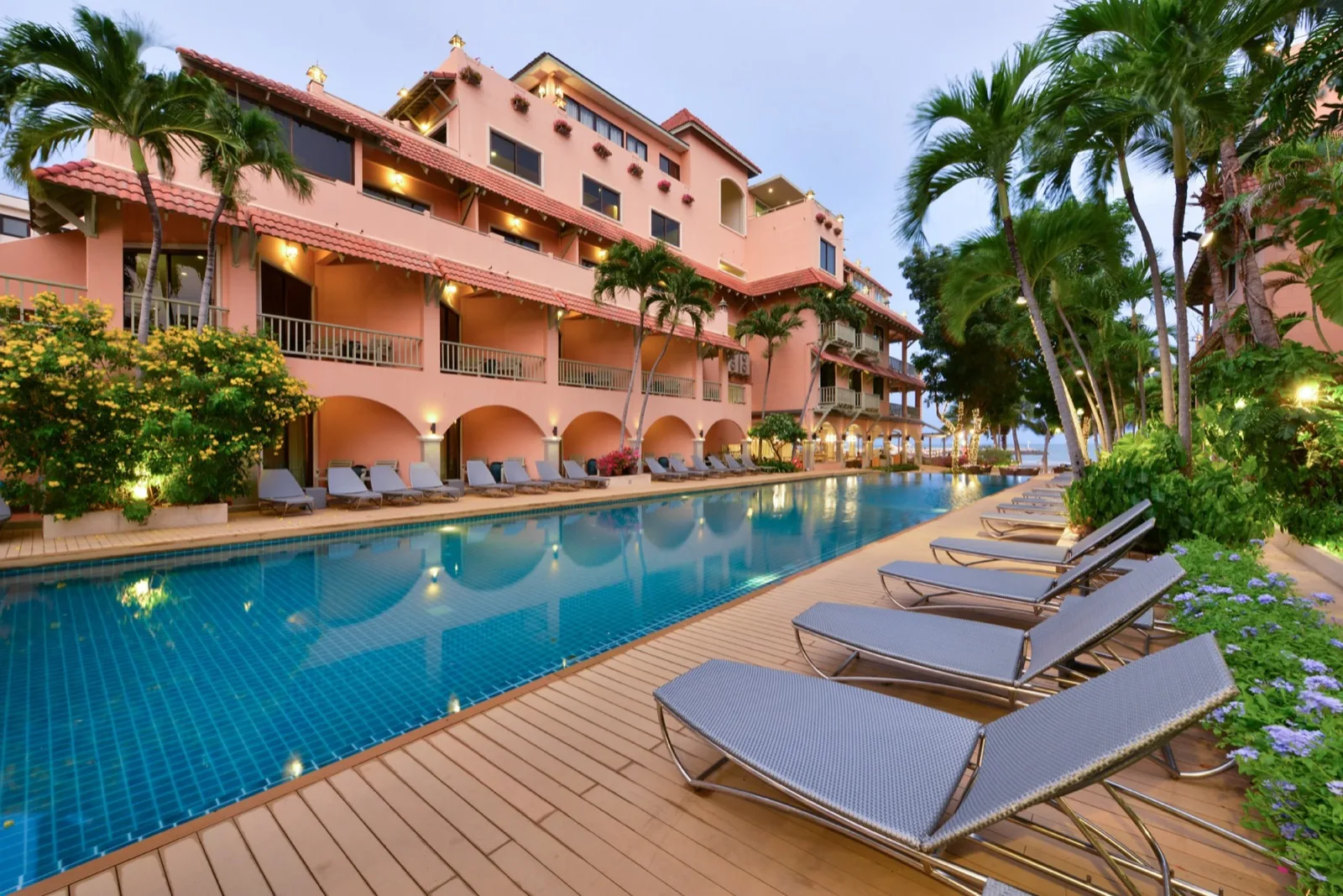 Sun loungers on the timber pool deck at Anantasila Beach Resort Hua Hin