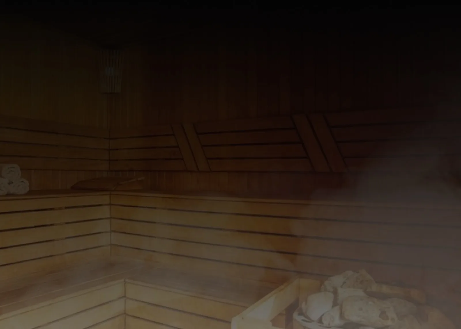 Wooden sauna interior with steam at AUM Sound Healing Center, Koh Phangan