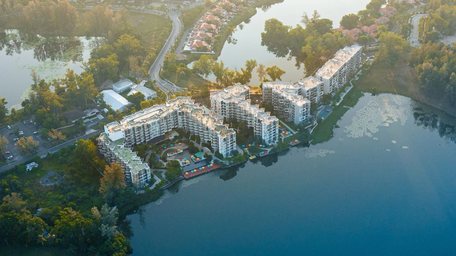 Aerial view of Cassia Phuket on the edge of a Laguna Phuket lagoon