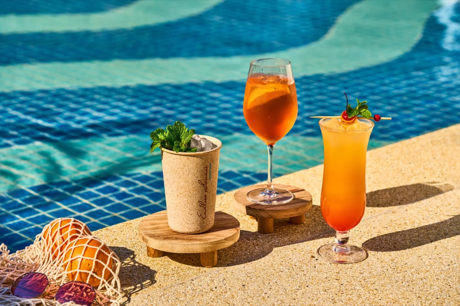 Cocktails and snacks on the edge of the infinity pool at Endless Summer Beach Club Phuket