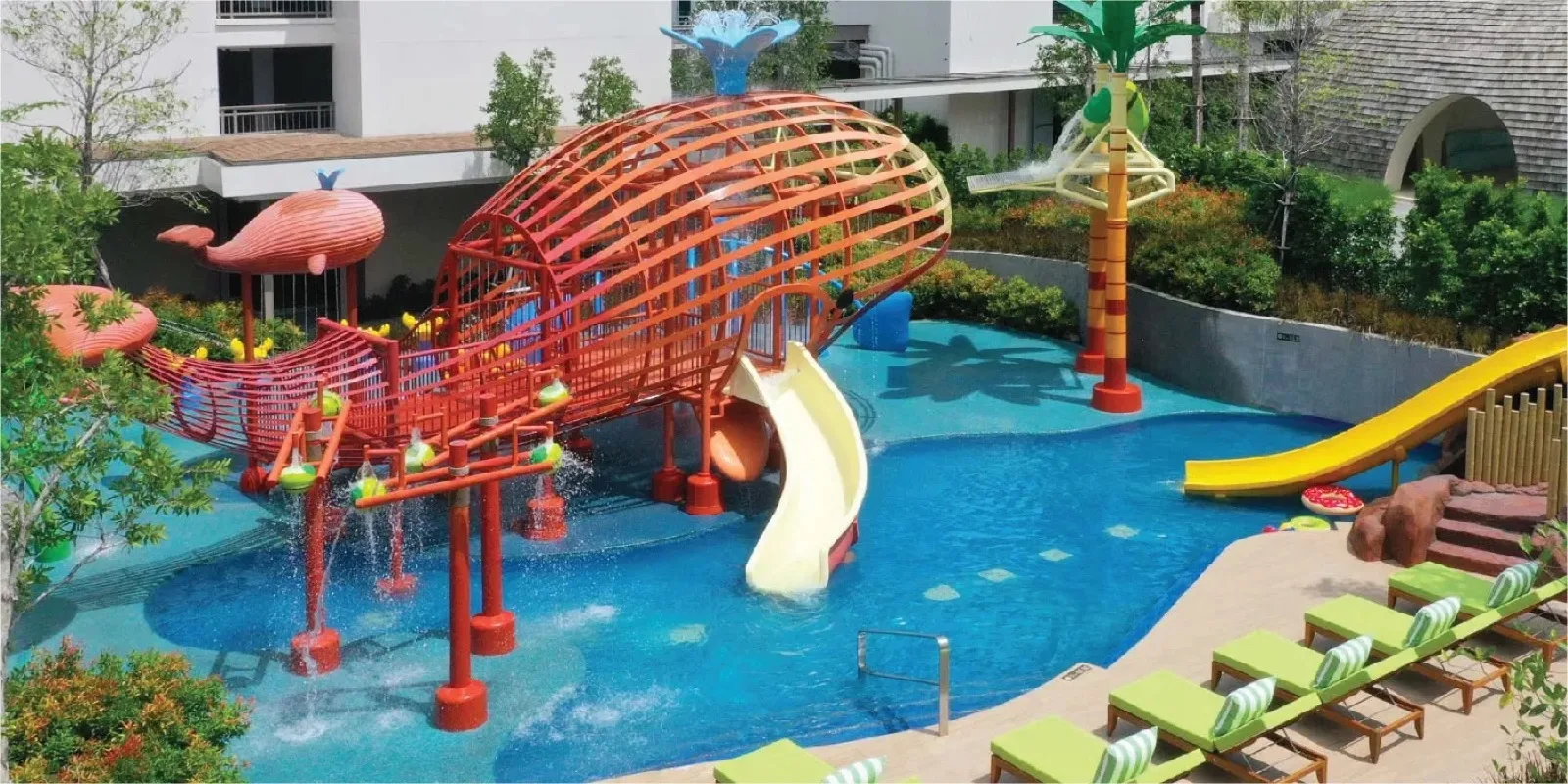 Splash Pad with fish-shaped climbing frame and water slides at Holiday Inn Resort Samui Bophut Beach