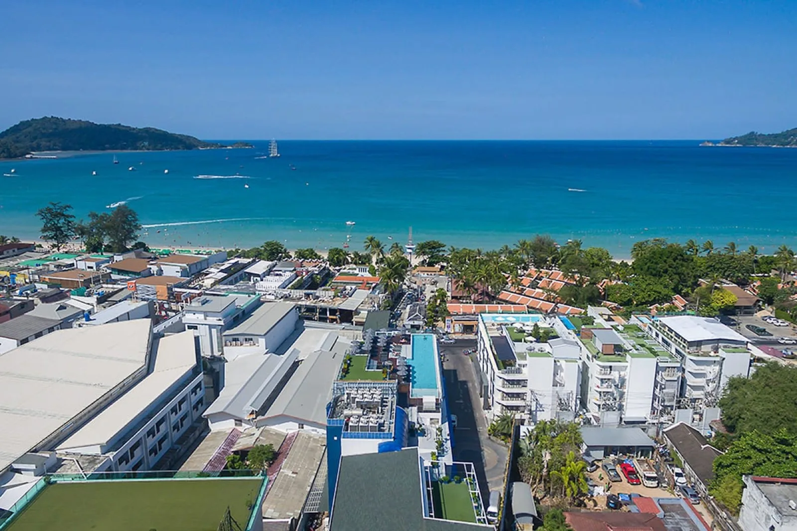 Drone view over Patong town and Patong Bay from above Hotel Clover Patong Phuket
