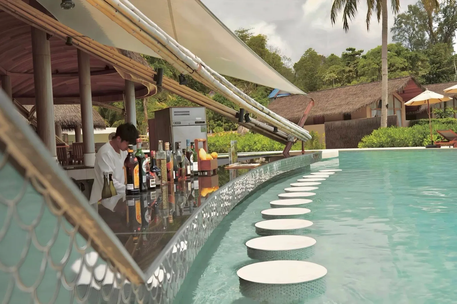 Swim up pool bar with stepping stone seats at Irene Resort on Koh Lipe