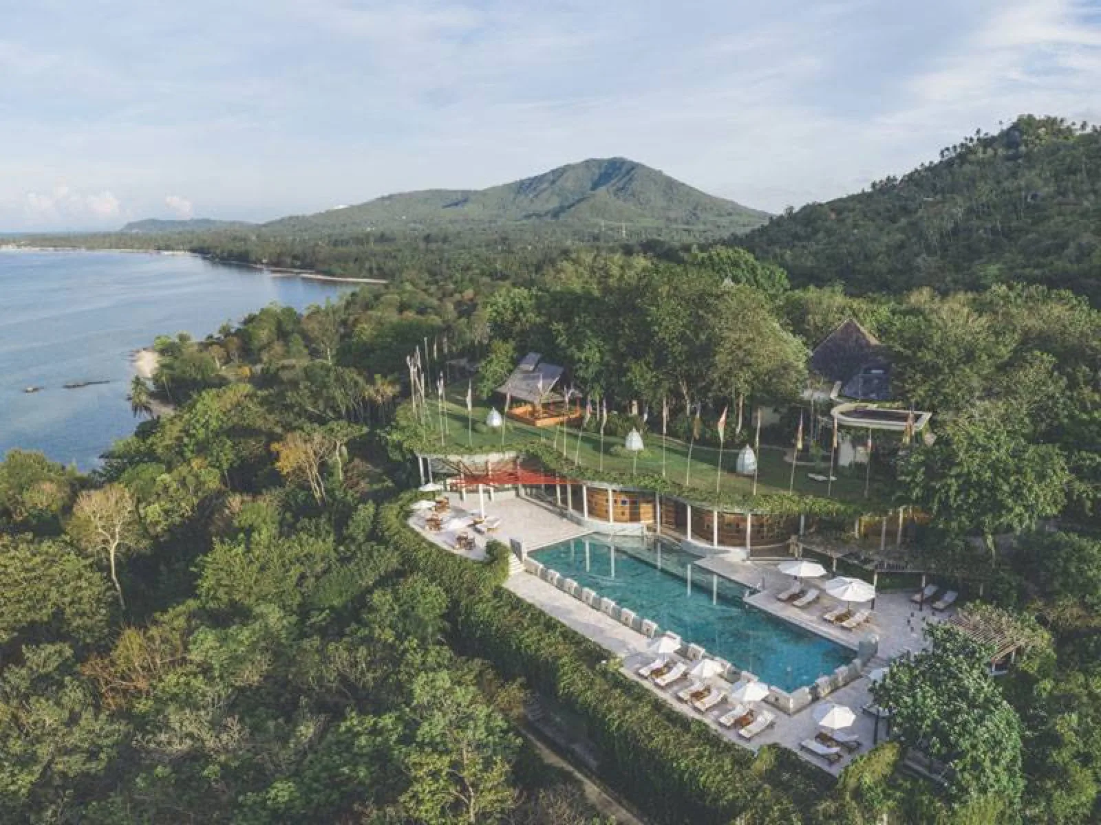 Aerial view of Kamalaya's pools and coastline at Laem Set, Koh Samui