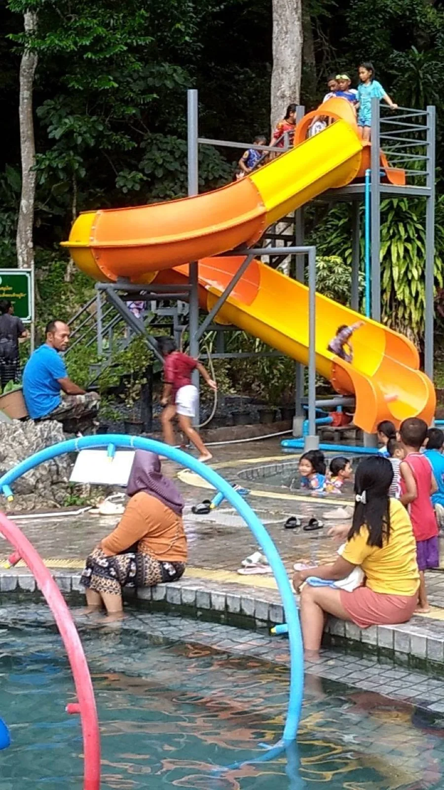 Children on the new water slide at Khao Chaison Hot Spring