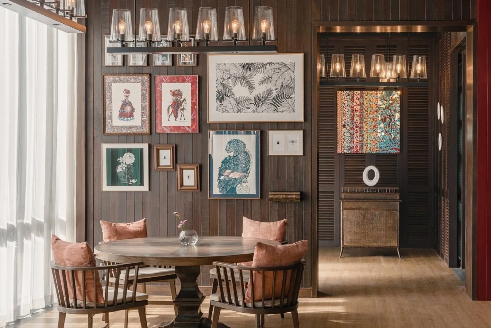 Boho cafe dining room with Thai artwork at Kimpton Kitalay Samui