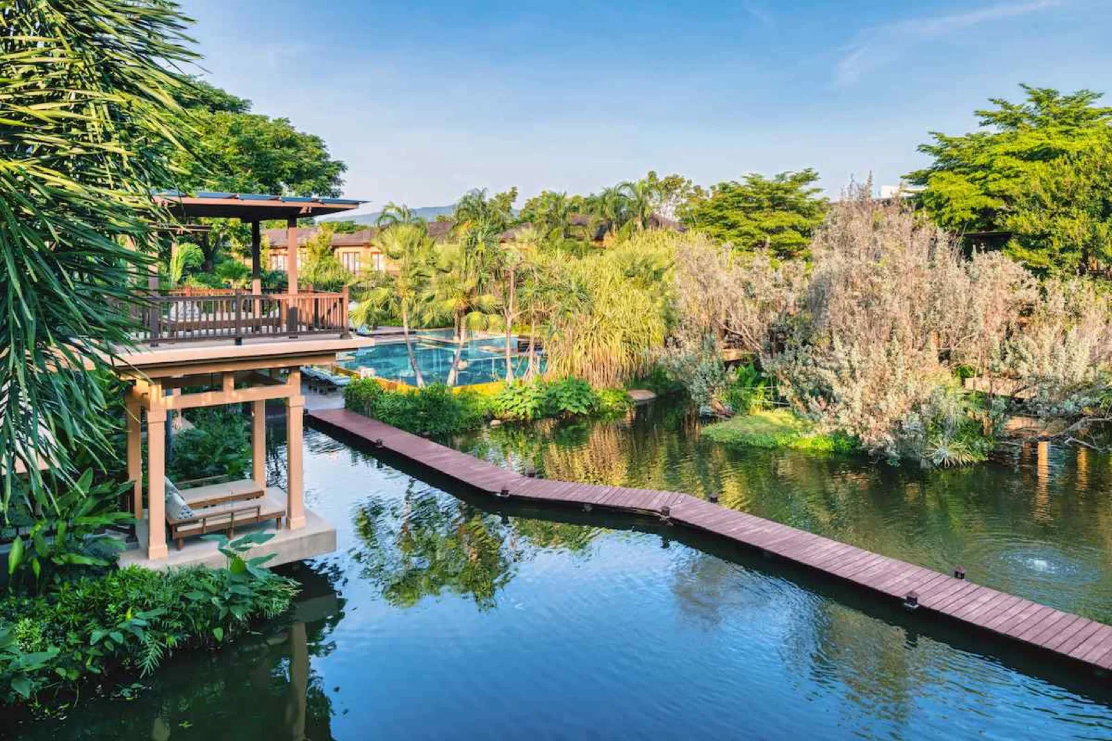 Lagoon, timber boardwalk and garden sala at Mövenpick Asara Resort and Spa Hua Hin