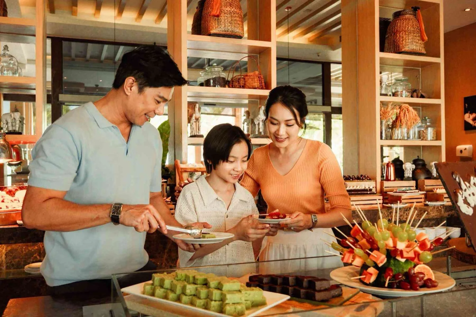 Family at the Mövenpick Chocolate Hour buffet, Mövenpick Asara Resort and Spa Hua Hin