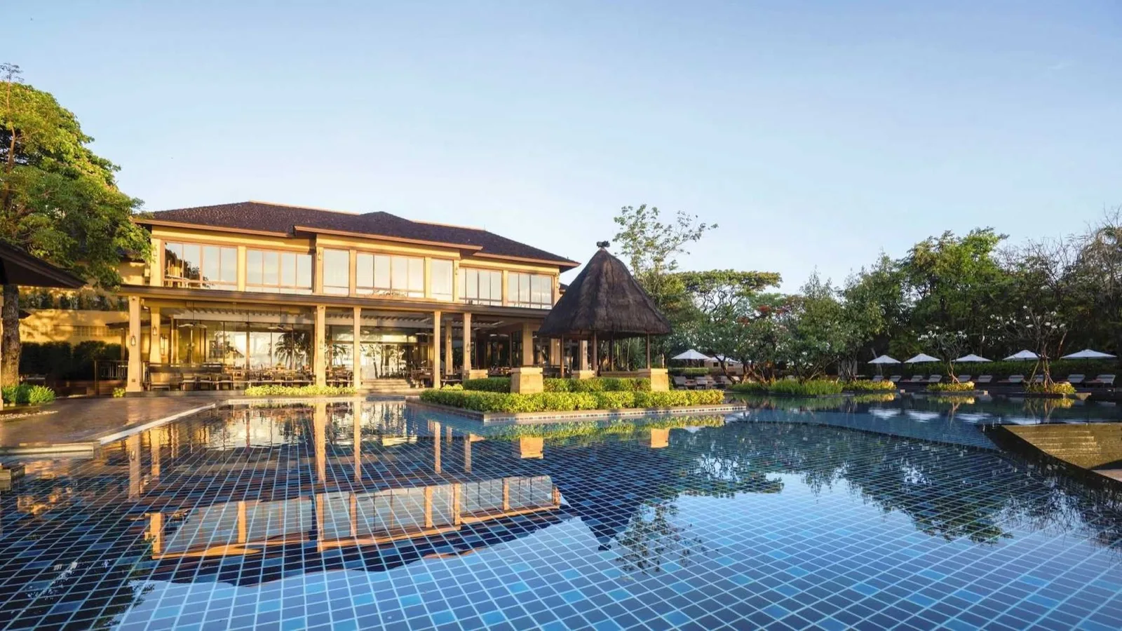 Main swimming pool and resort building at Mövenpick Asara Resort and Spa Hua Hin