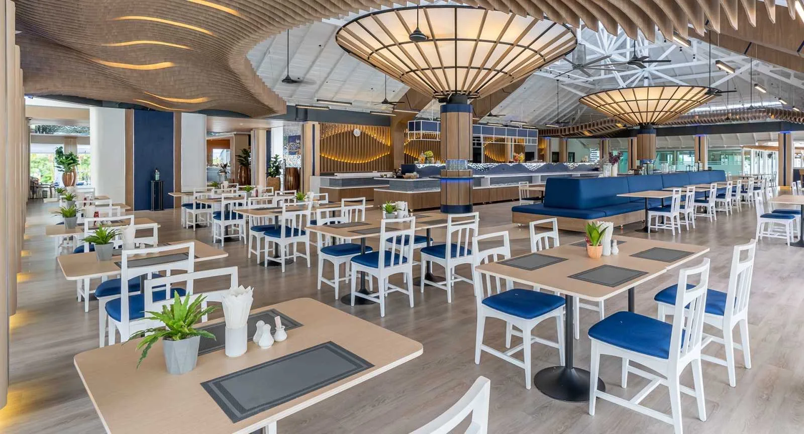 Bright all-day dining restaurant at NH Boat Lagoon Phuket Resort