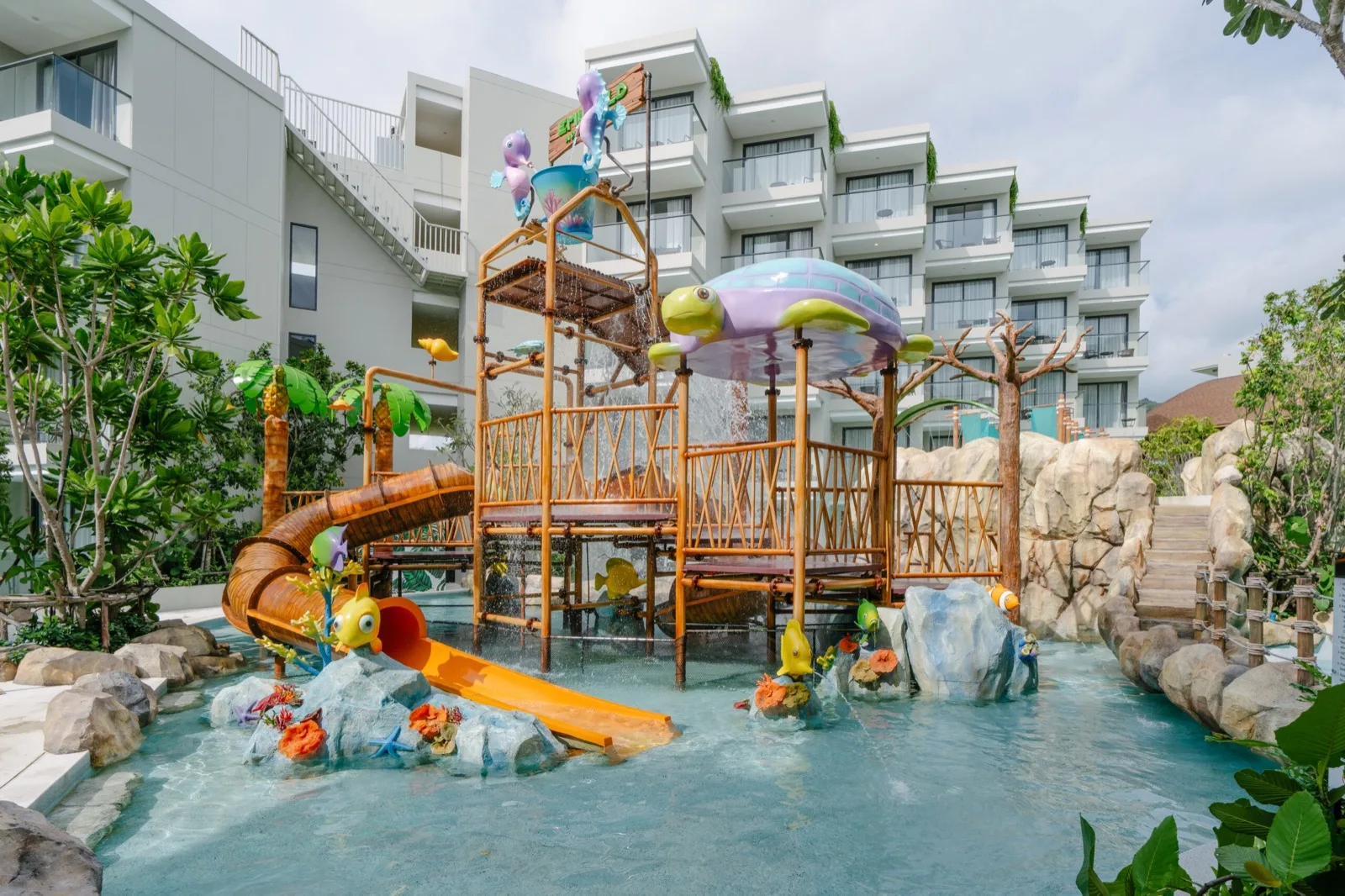 Kids' water playground with slides and splash features at Phuket Emerald Beach Resort