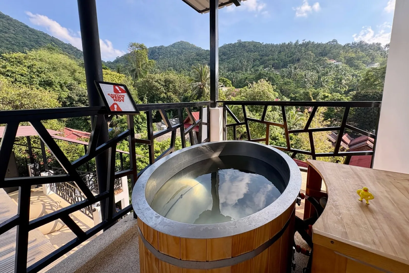Filtered ice bath tub on the balcony at Recovery Club Koh Tao with jungle hills behind