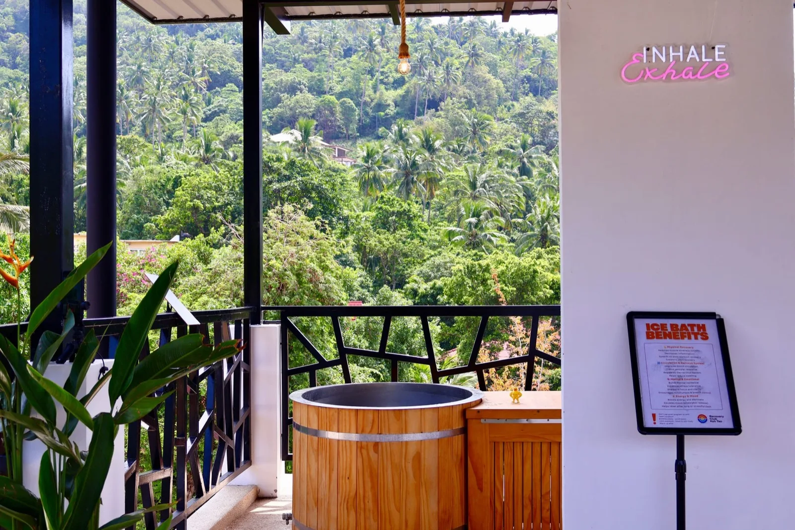 Wooden ice bath barrel and sauna signage on the open balcony at Recovery Club Koh Tao