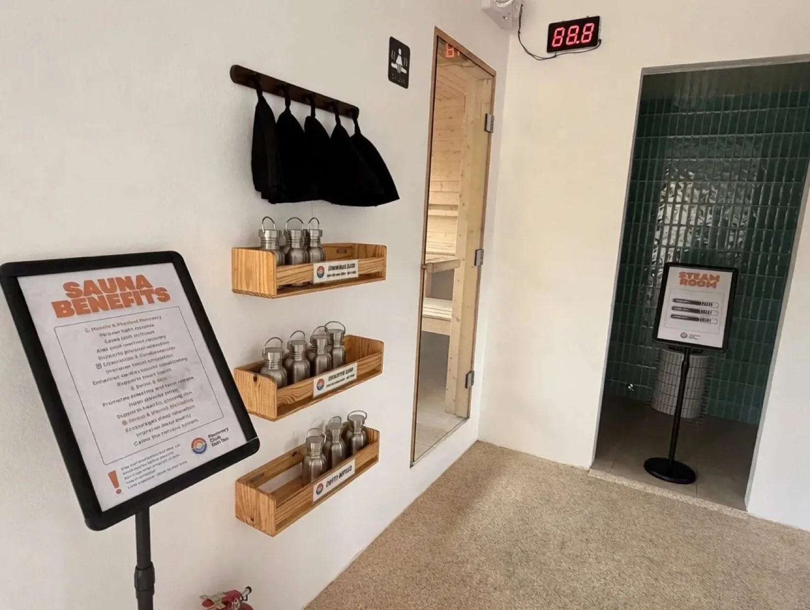Sauna entrance with essential oils and sauna benefits sign at Recovery Club Koh Tao