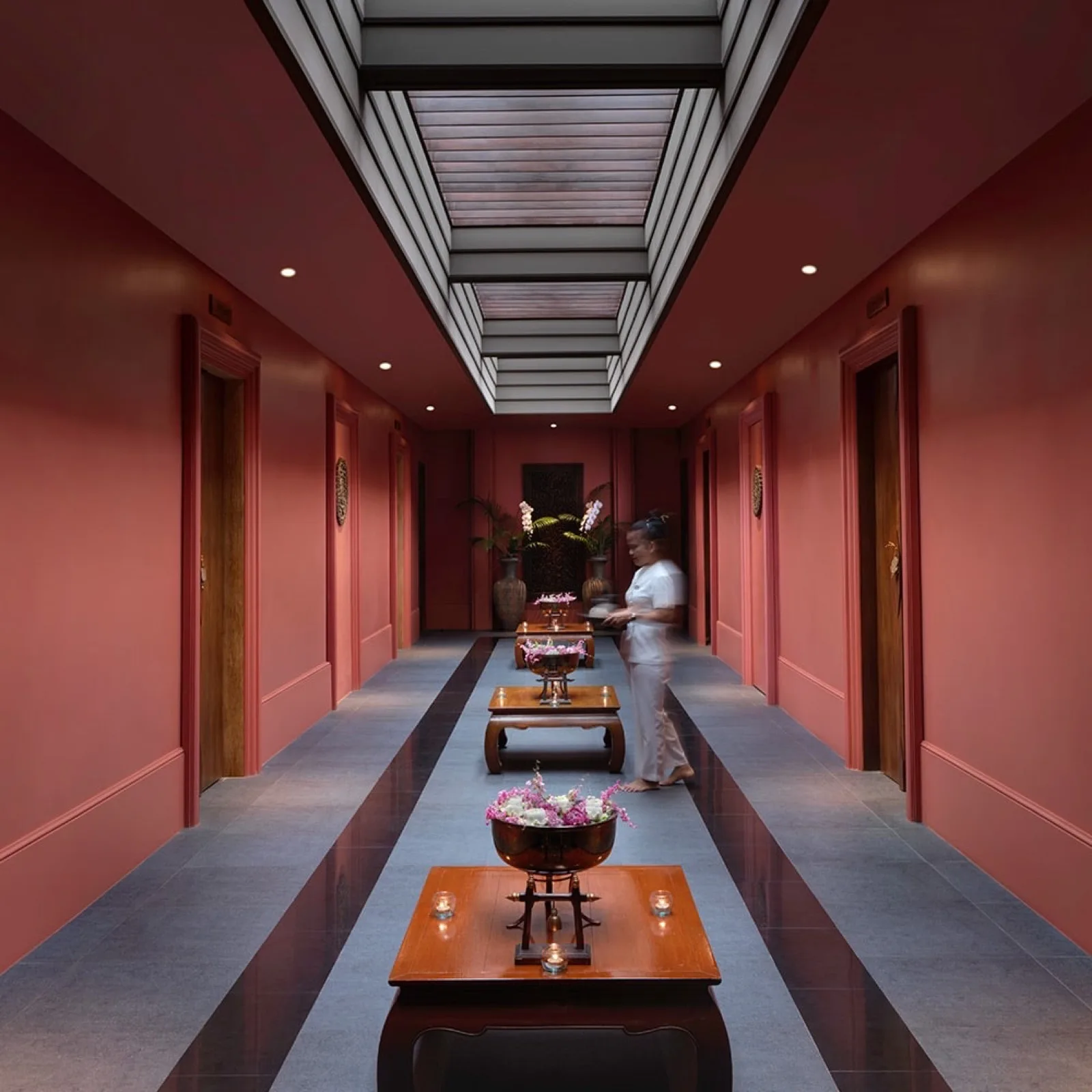 Candlelit corridor inside Santiburi Spa at Santiburi Koh Samui