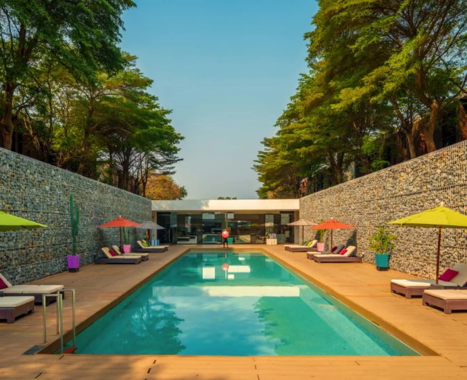 Adults-only Solarium Pool with colourful umbrellas at SO/ Sofitel Hua Hin