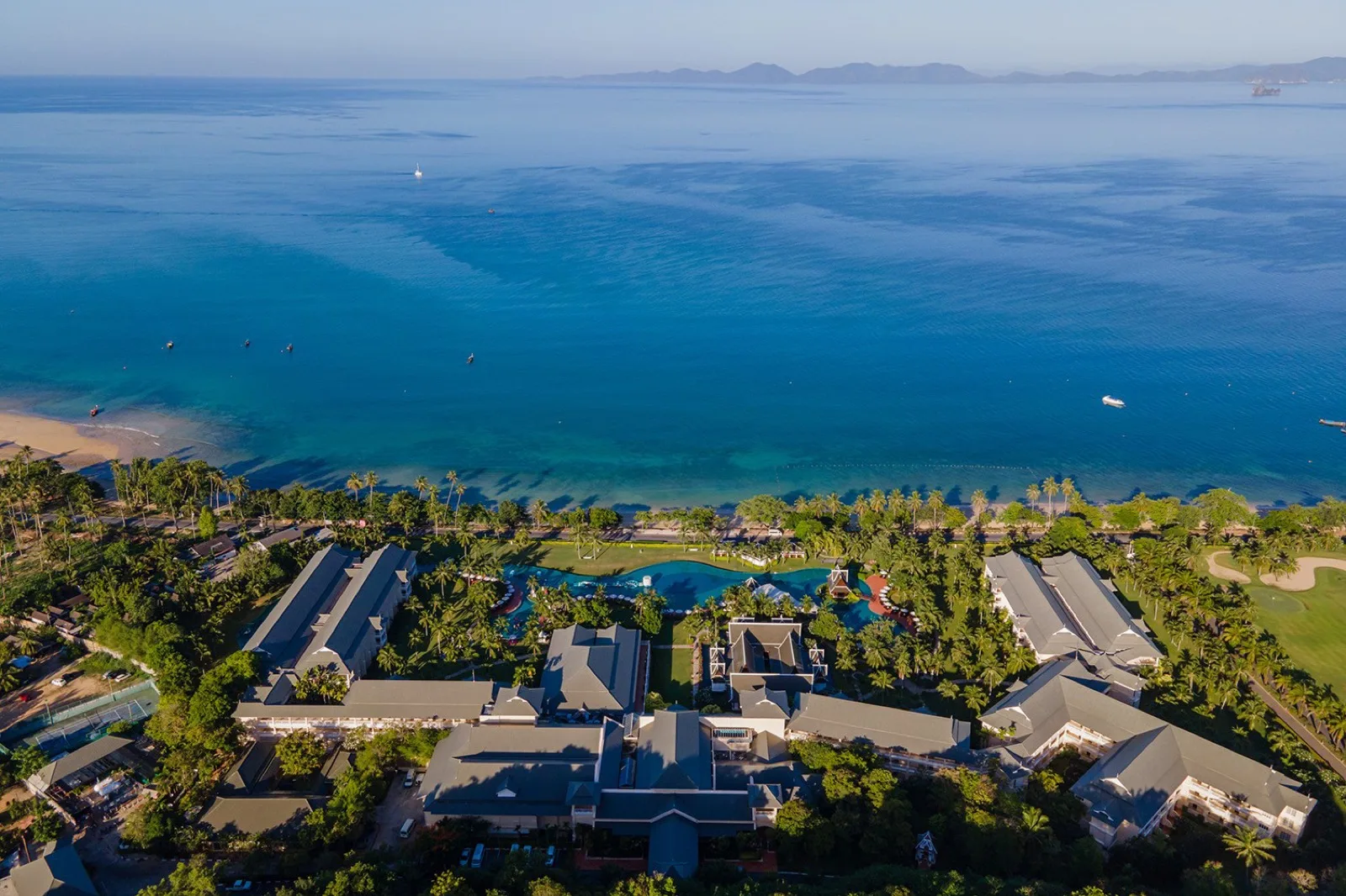 Sofitel Krabi Phokeethra resort grounds and pools with the Andaman Sea beyond