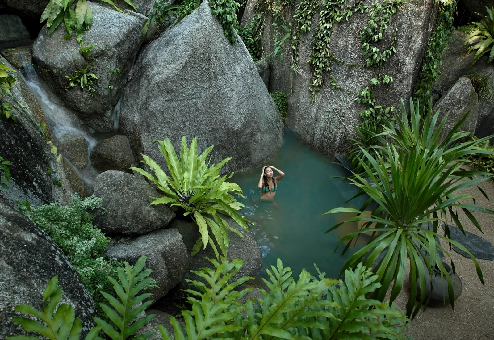 Natural rock plunge pools among granite boulders at Tamarind Springs