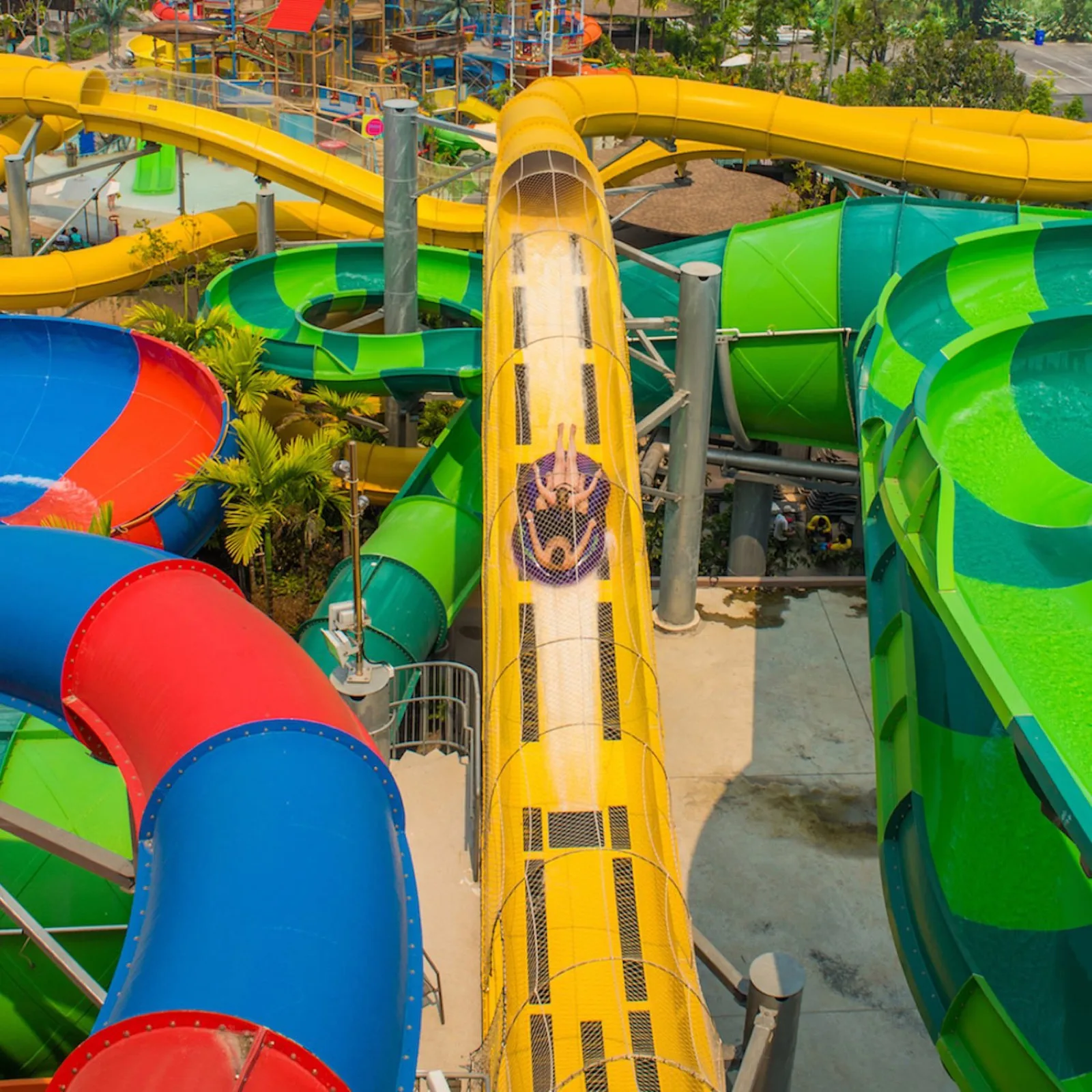 Slide tower with tall enclosed waterslides at Vana Nava Water Jungle