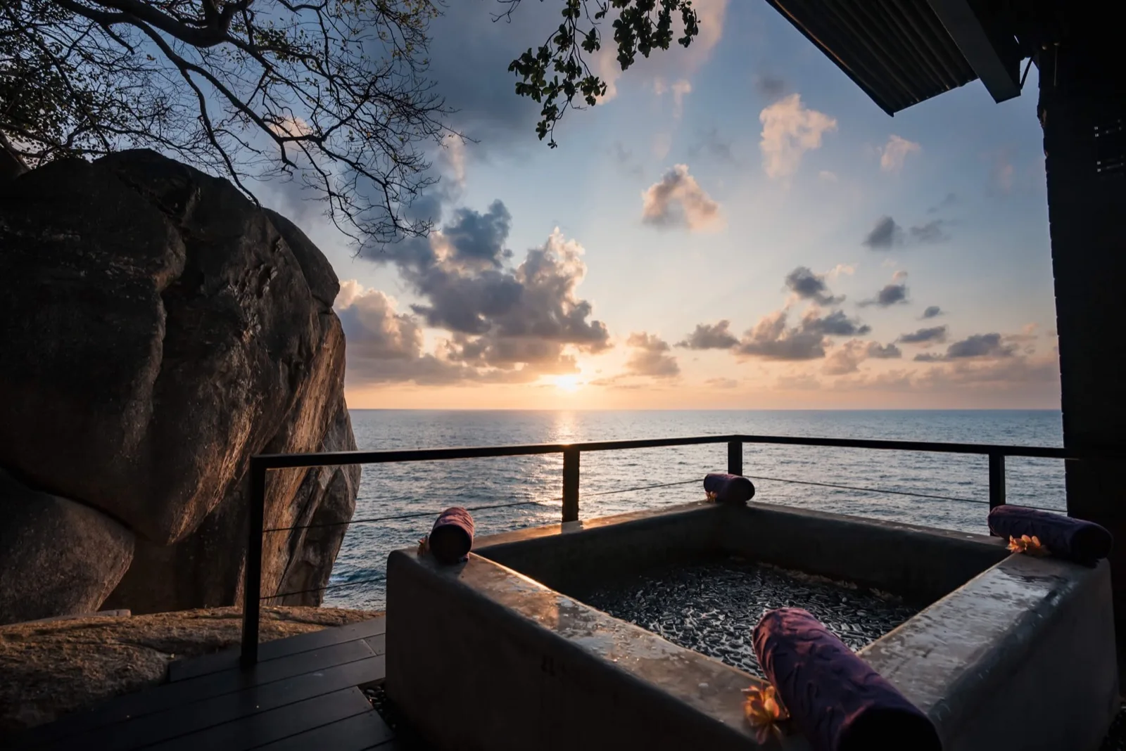 Sea-view deck among the boulders at Vikasa Yoga Retreat