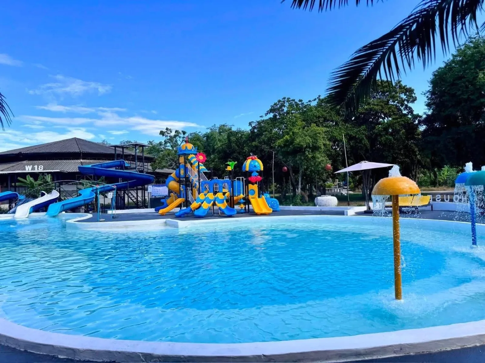 Children's slide tower and splash pool at Warehouse18 Pool Cafe Resort, Don Sak